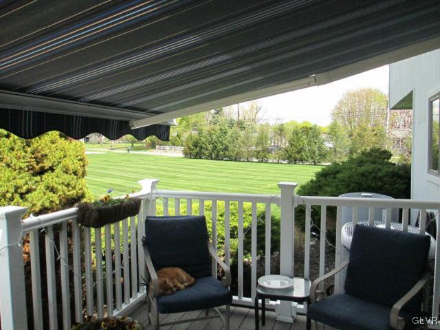 343 Forest Road Nazareth, PA 18064 - Photo 30 of 32 a view of a chairs and table in patio with wooden fence
