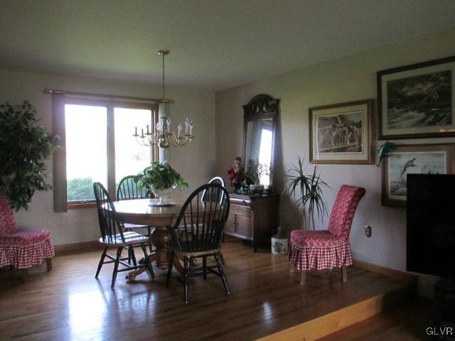 343 Forest Road Nazareth, PA 18064 - Photo 10 of 32 a view of a dining room with furniture window and wooden floor