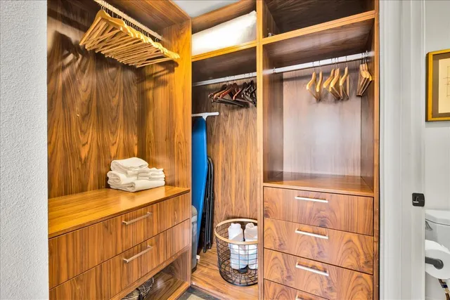 a bathroom with a tub and shower