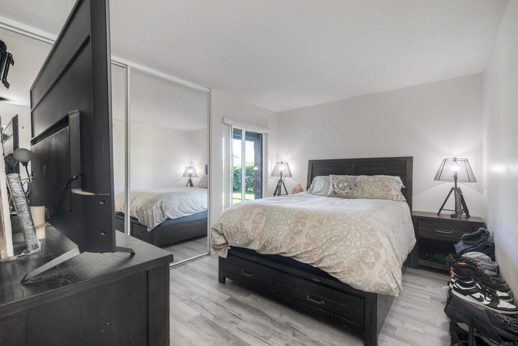 4413 Point Degada Oceanside, CA 92058 - Photo 23 of 46 a bedroom with a bed a couch and dresser