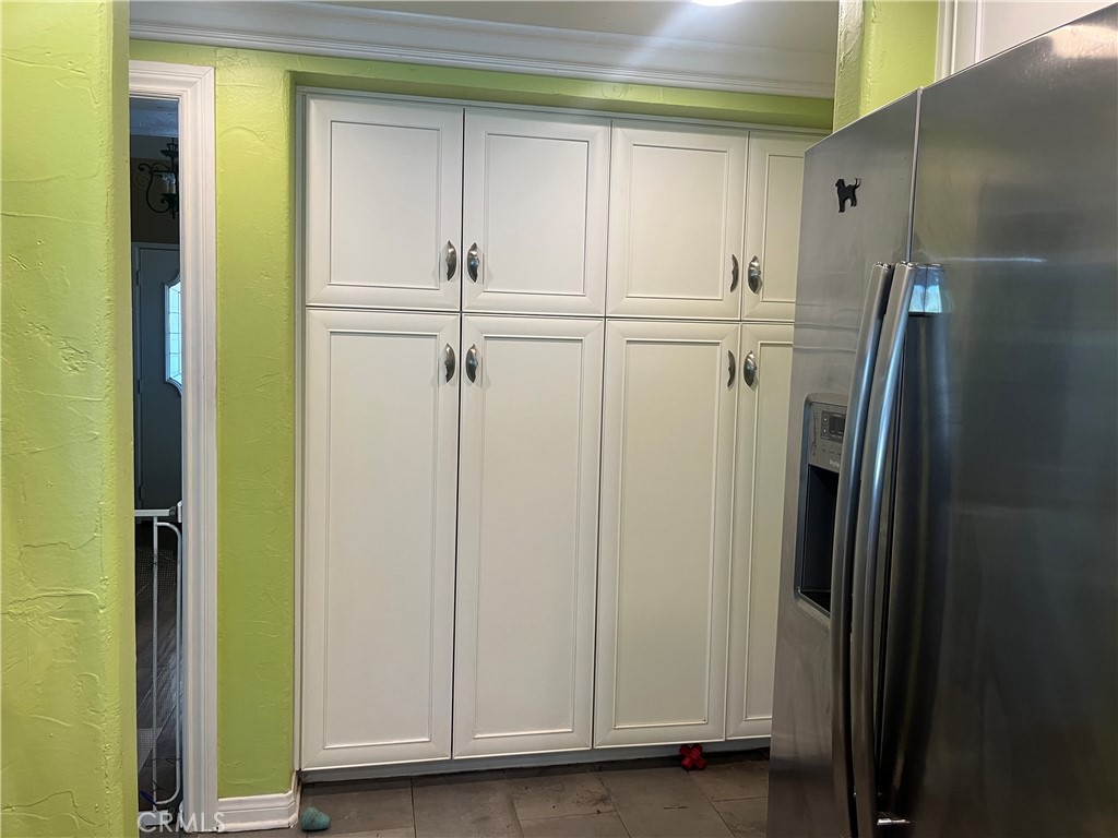 31420 Corte Madera Temecula, CA 92592 - Photo 13 of 54 a view of cabinets and wooden door