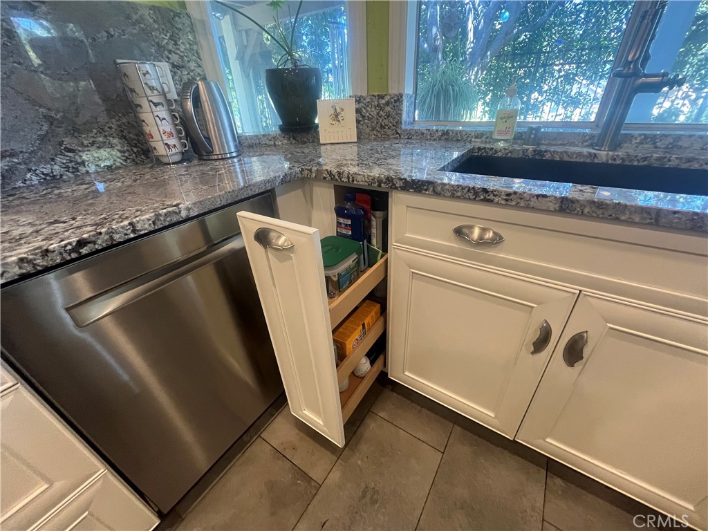 31420 Corte Madera Temecula, CA 92592 - Photo 17 of 54 a view of a storage and utility room with washer and dryer