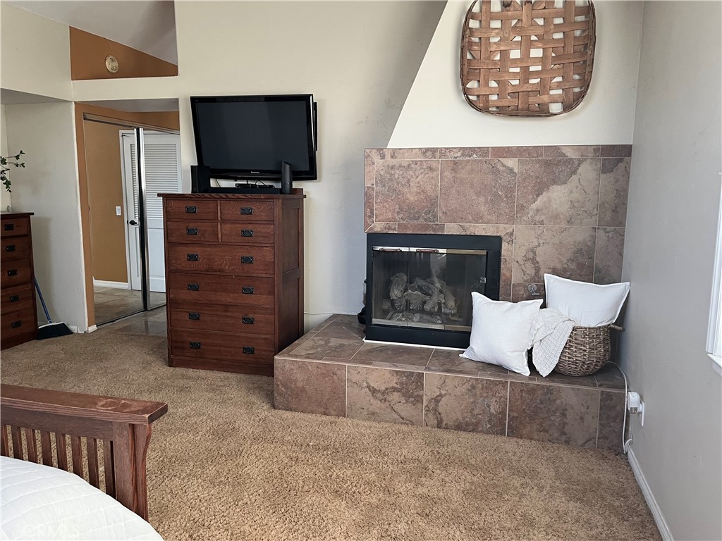 31420 Corte Madera Temecula, CA 92592 - Photo 24 of 54 a living room with furniture and a flat screen tv