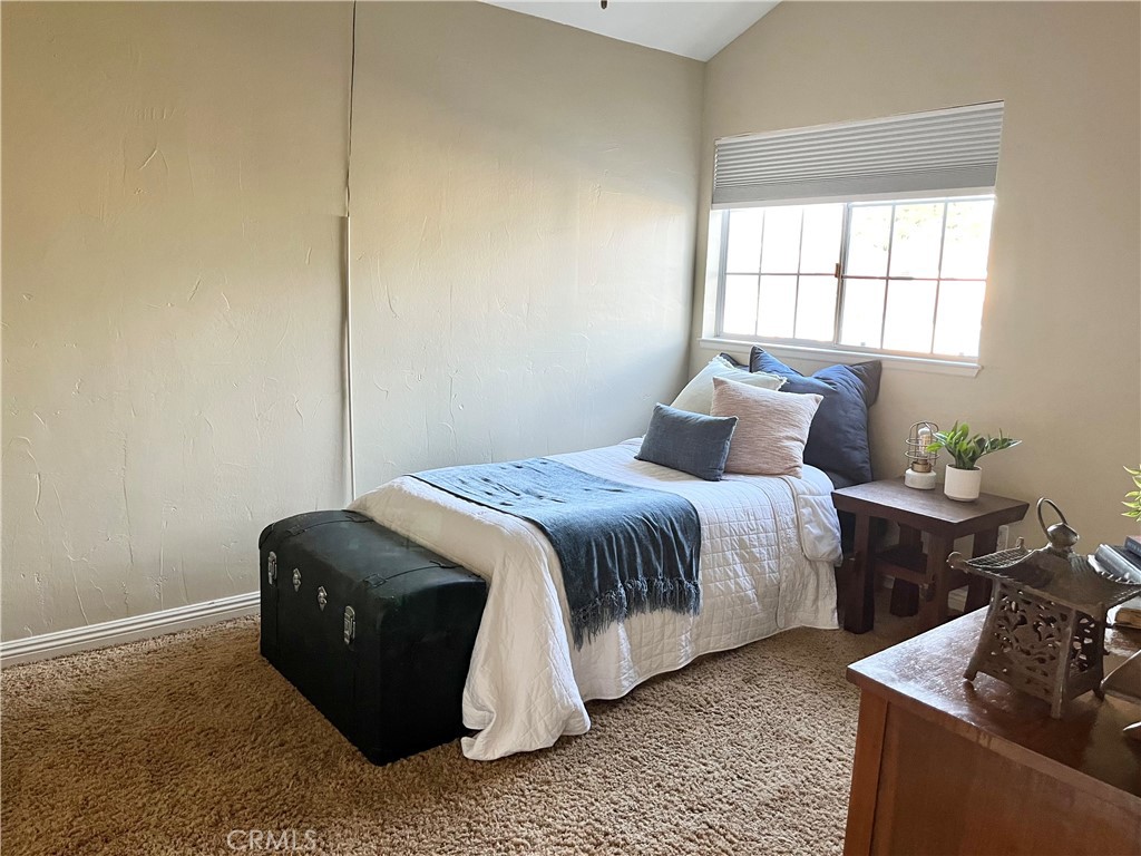 31420 Corte Madera Temecula, CA 92592 - Photo 27 of 54 a bedroom with a bed and a window