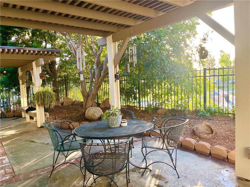 31420 Corte Madera Temecula, CA 92592 - Photo 34 of 54 a view of an outdoor dining space with a table and chairs