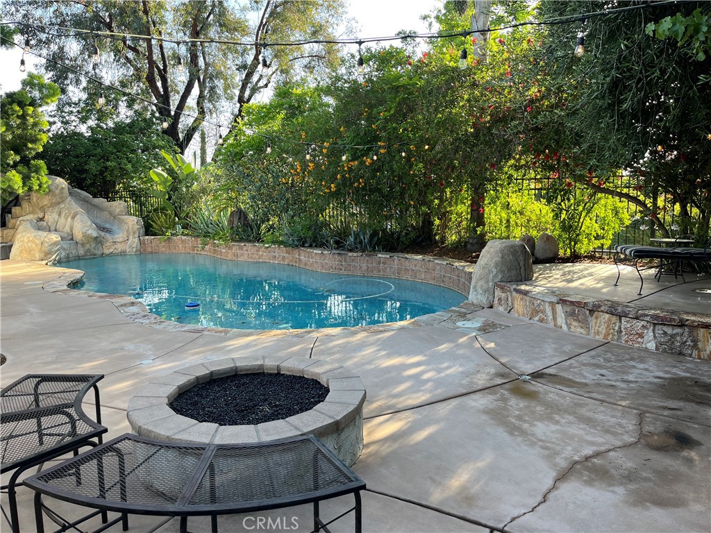 31420 Corte Madera Temecula, CA 92592 - Photo 44 of 54 a view of a swimming pool with a patio