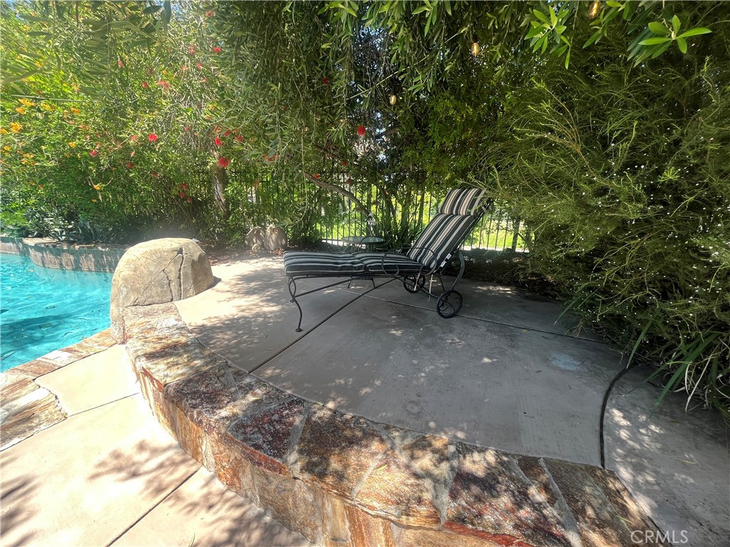 31420 Corte Madera Temecula, CA 92592 - Photo 45 of 54 a backyard of a house with table and chairs