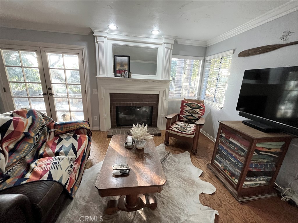 31420 Corte Madera Temecula, CA 92592 - Photo 7 of 54 a living room with furniture fireplace and a flat screen tv