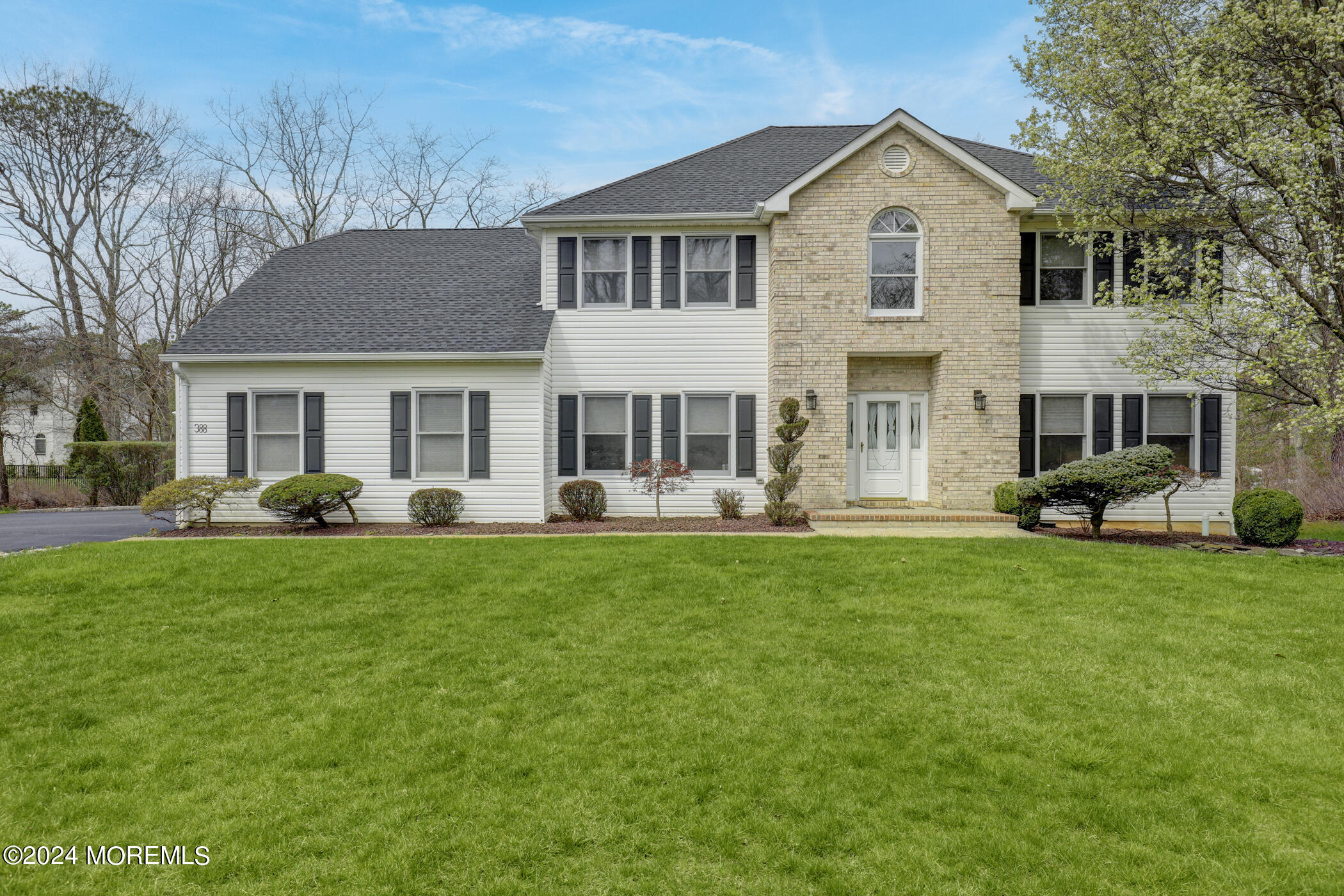 388 Jackson Mills Road Freehold, NJ 07728 - Photo 1 of 37 a front view of a house with a yard