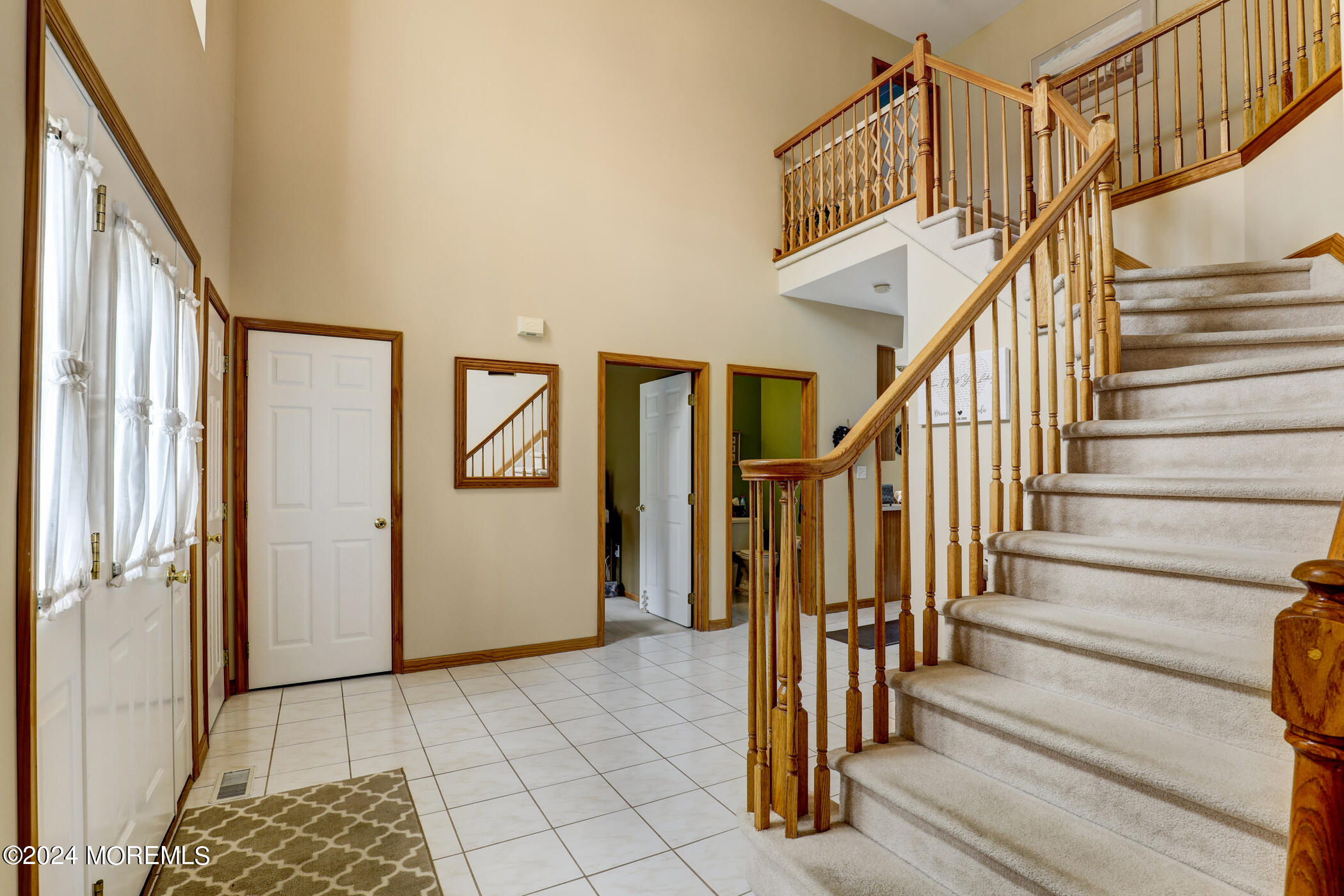 388 Jackson Mills Road Freehold, NJ 07728 - Photo 3 of 37 a view of entryway and hall with wooden floor
