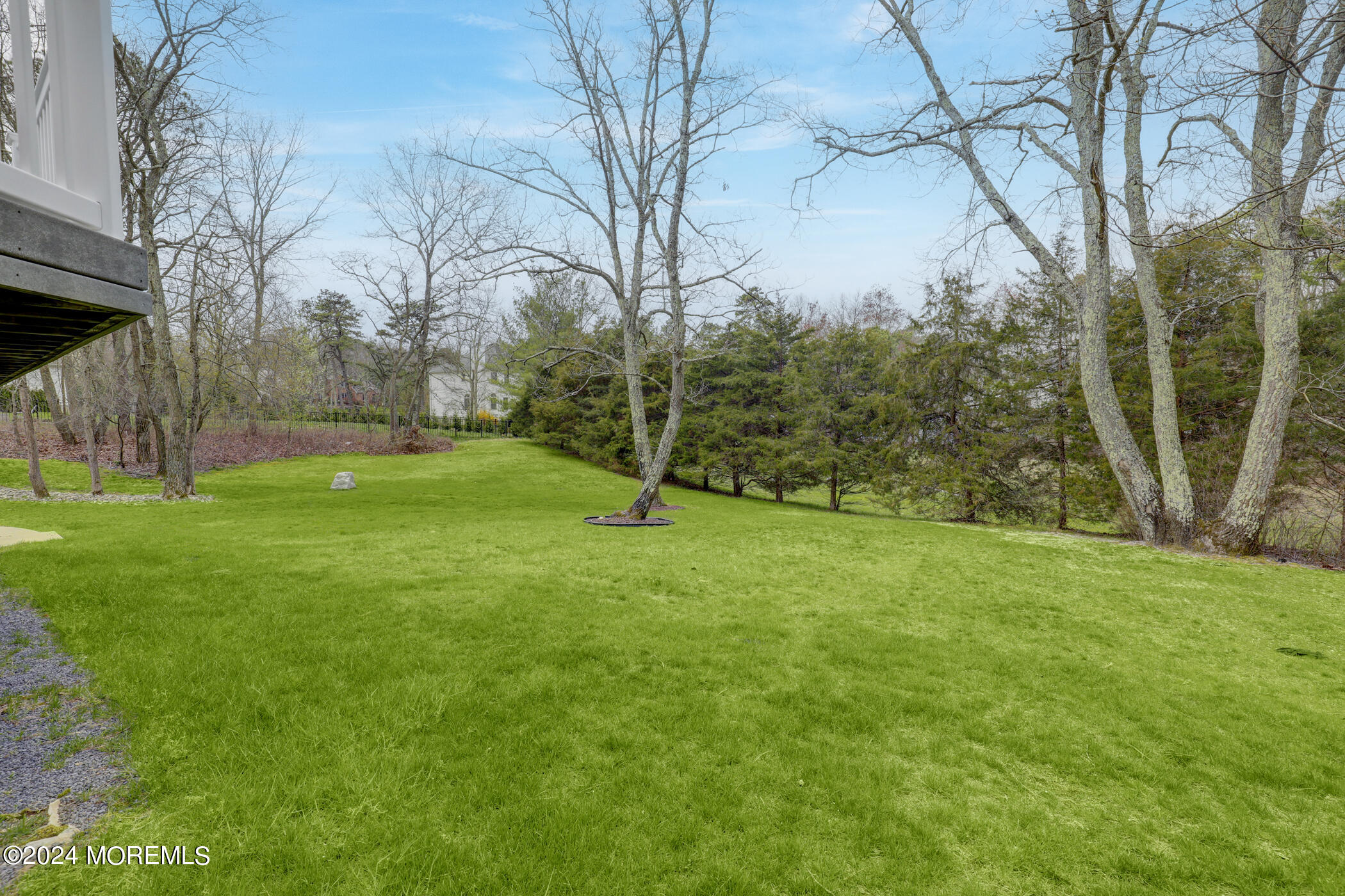 388 Jackson Mills Road Freehold, NJ 07728 - Photo 36 of 37 a view of a backyard with large trees
