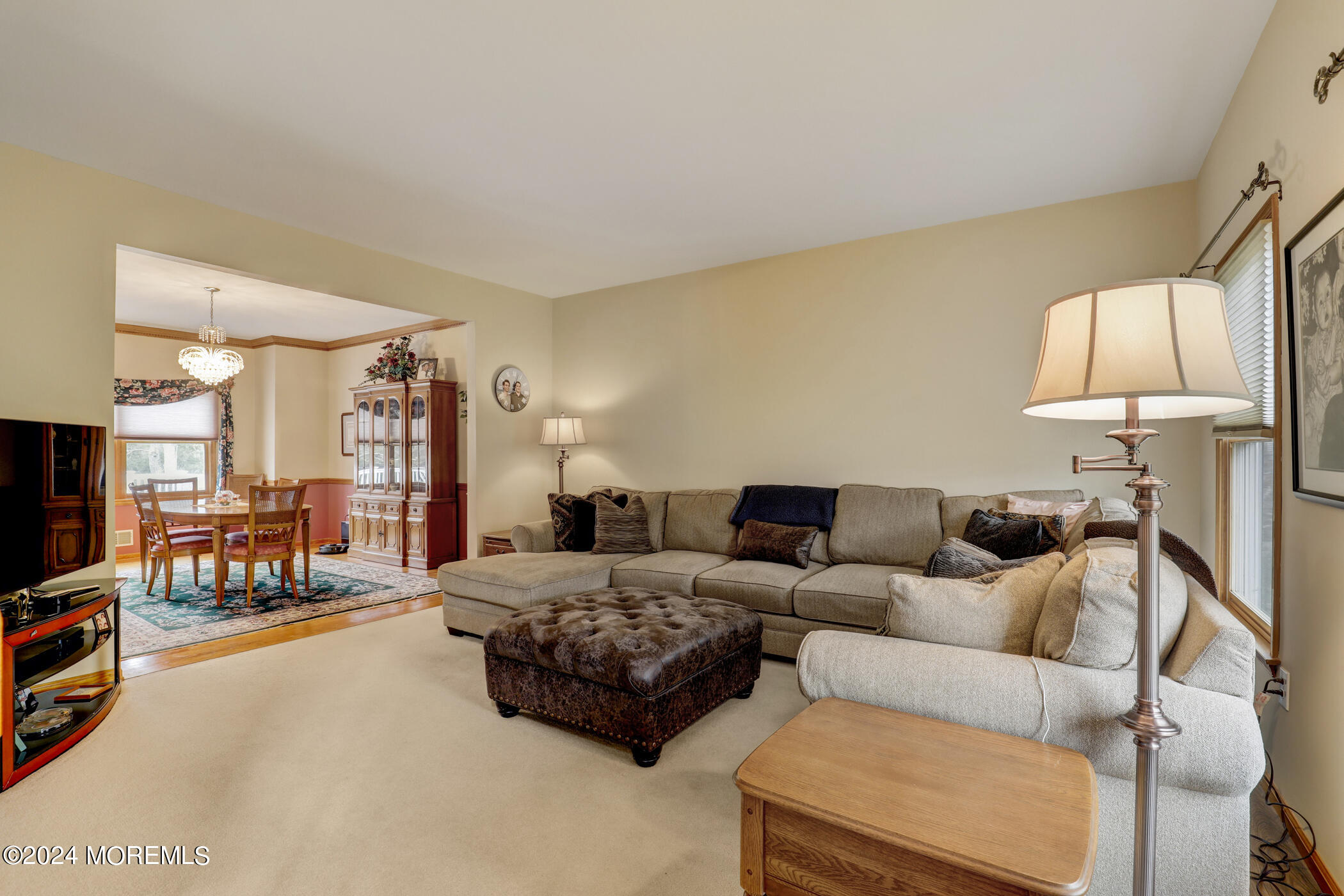 388 Jackson Mills Road Freehold, NJ 07728 - Photo 5 of 37 a living room with furniture and a flat screen tv