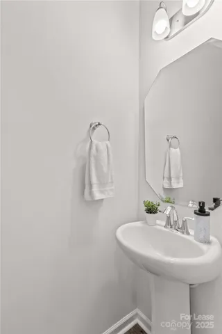 a bedroom with a large bed and a large window