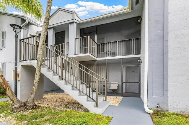 a view of a bathroom from the hallway