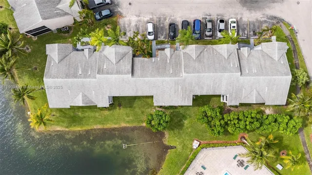 an aerial view of a city and lake view