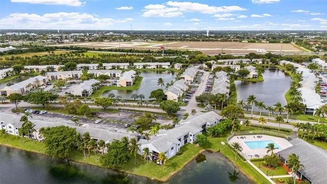 a view of a house with a swimming pool