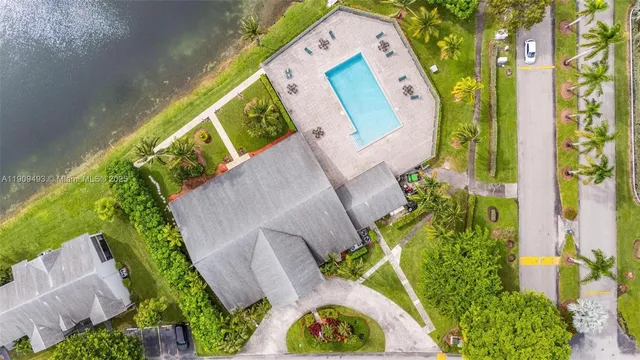 an aerial view of a city and lake view