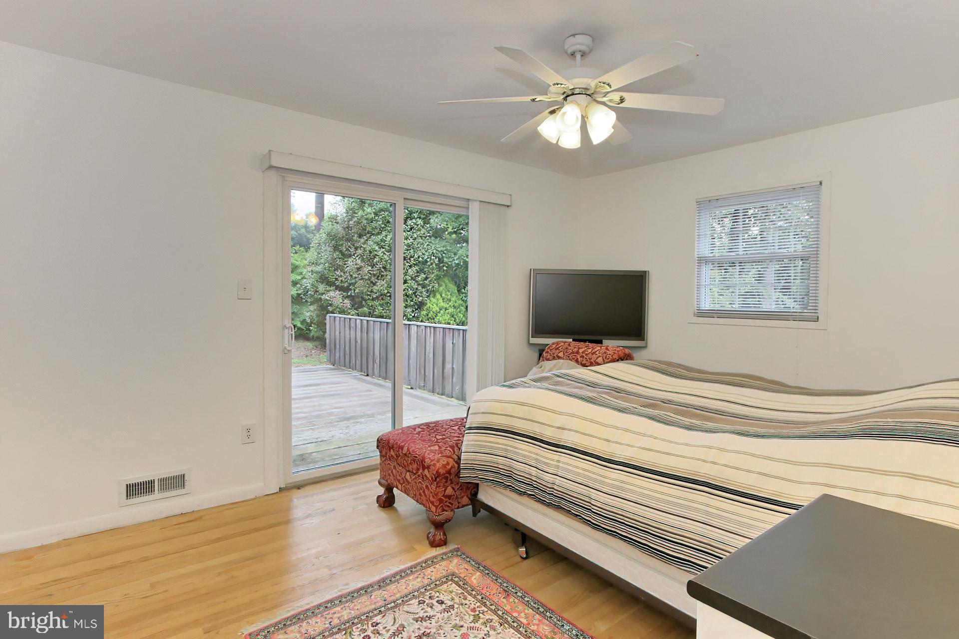 6305 Gormley Place Springfield, VA 22152 - Photo 20 of 66 Primary bedroom has sliding doors to IPE wood deck