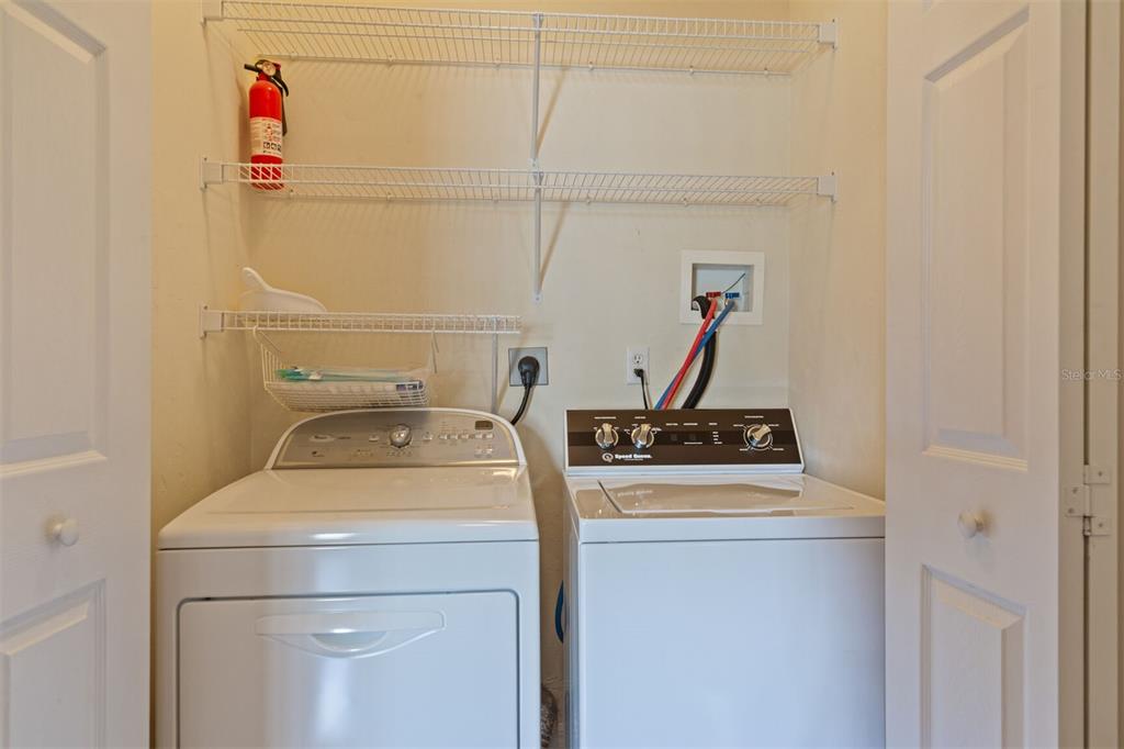 4748 Northwest 77 Road Gainesville, FL 32653 - Photo 17 of 21 a utility room with dryer and washer