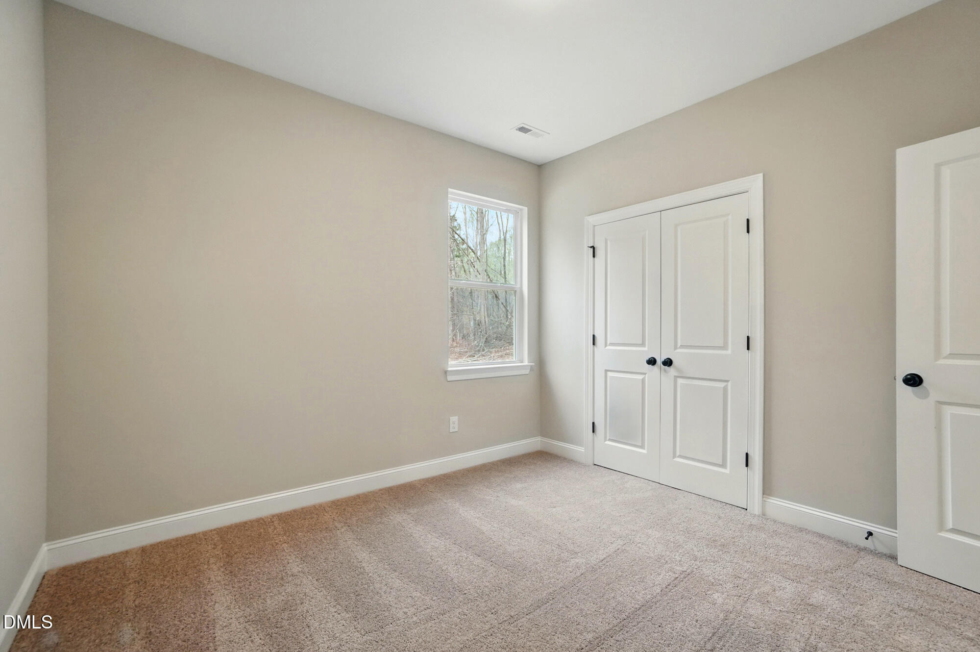 285 Gilliland Road Siler City, NC 27344 - Photo 27 of 45 a view of an empty room with a window