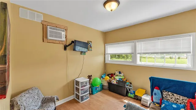 a room with furniture and a window