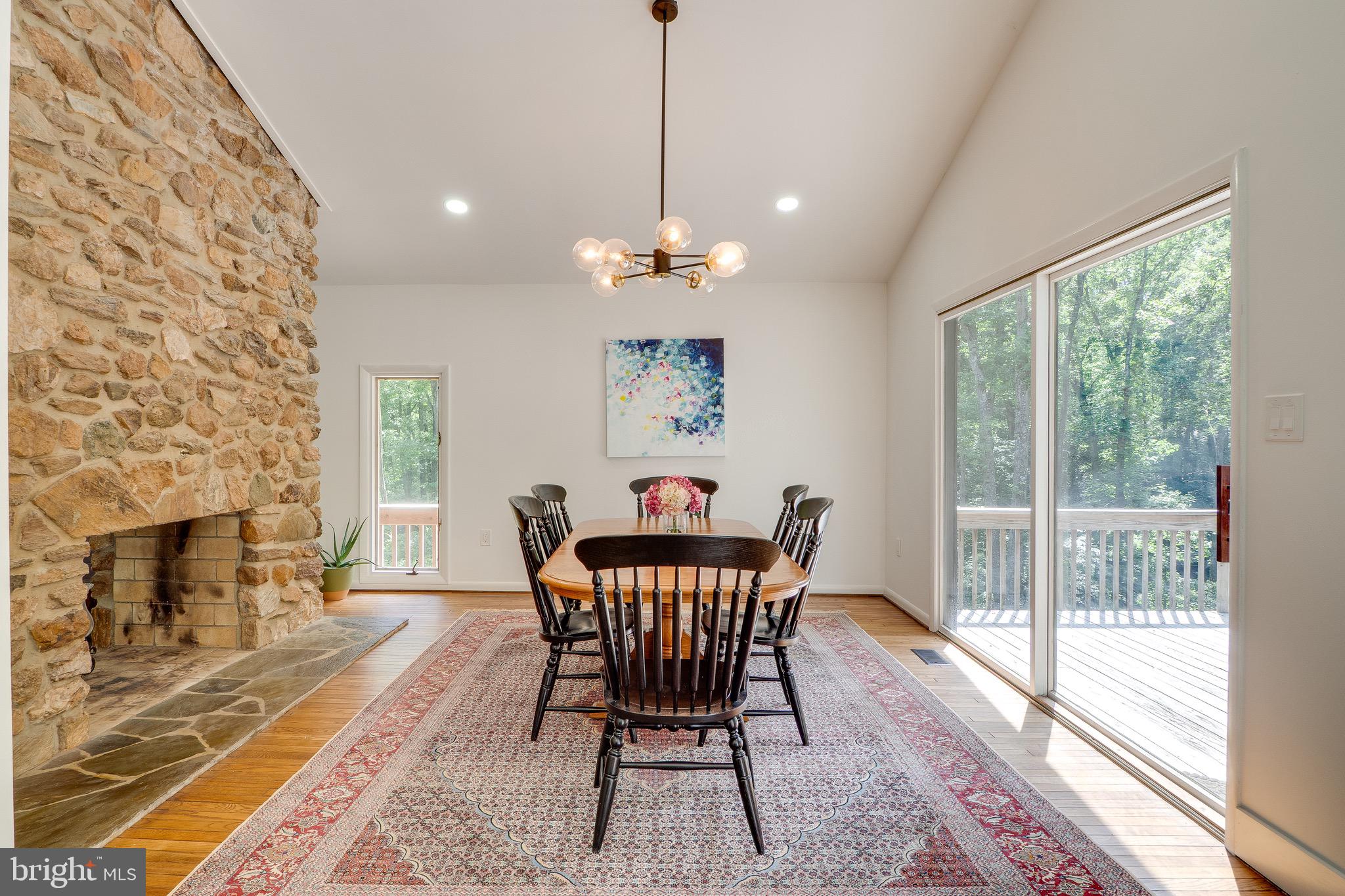 10236 Lawyers Road Vienna, VA 22181 - Photo 13 of 47 Dining room opens to deck for easy entertaining