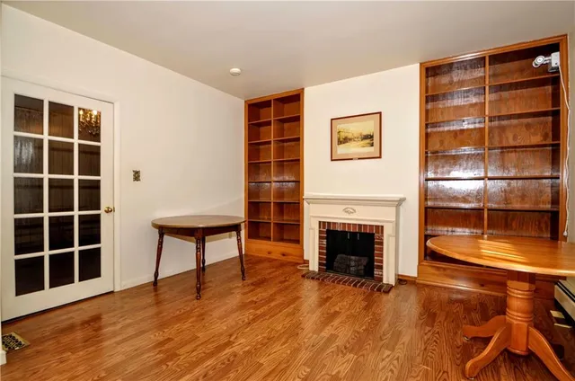 a view of a livingroom with furniture and staircase
