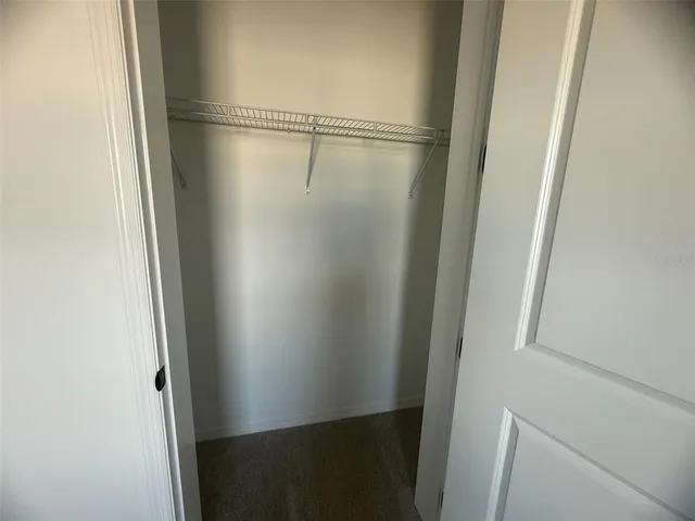 a view of a room with an empty space