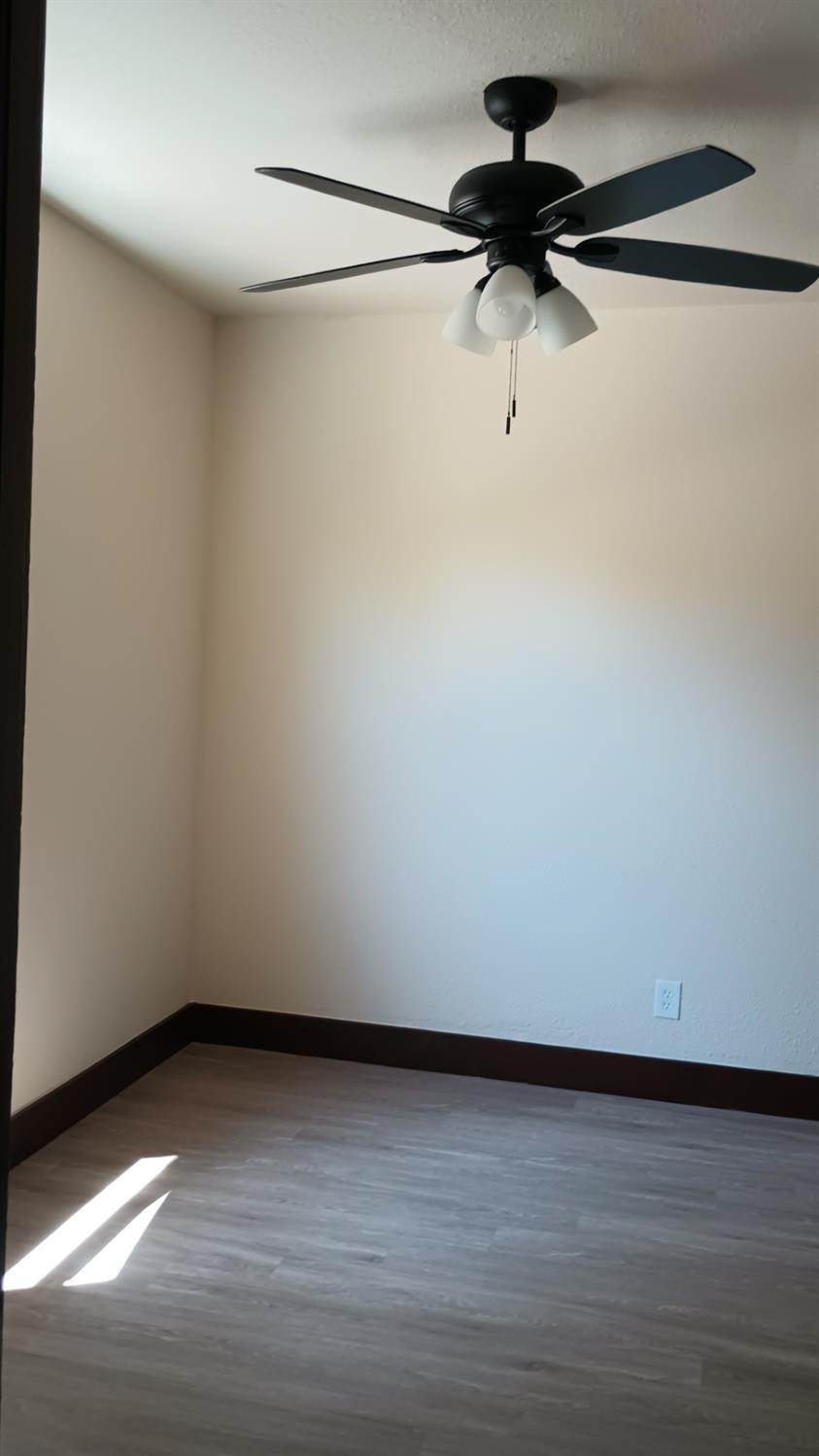 1327 North Ferger Avenue Fresno, CA 93728 - Photo 13 of 22 a view of a room with an empty shelf