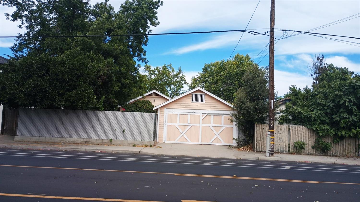 1327 North Ferger Avenue Fresno, CA 93728 - Photo 2 of 22 a view of a house with a street