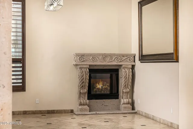 a spacious bathroom with a granite countertop sink a mirror and shower