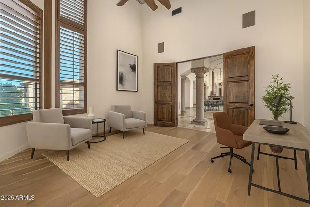 an aerial view of a house with a yard