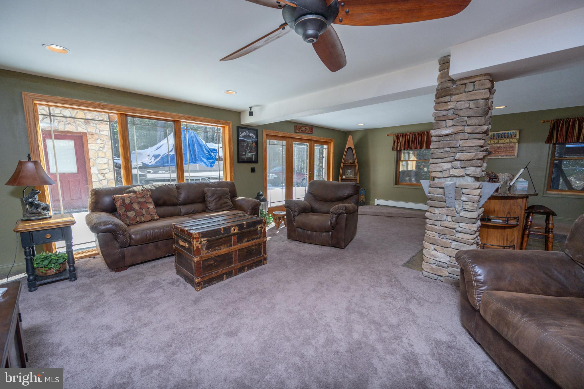542 Bench Road Swanton, MD 21561 - Photo 27 of 60 Glass sliders for access to outside & garage area