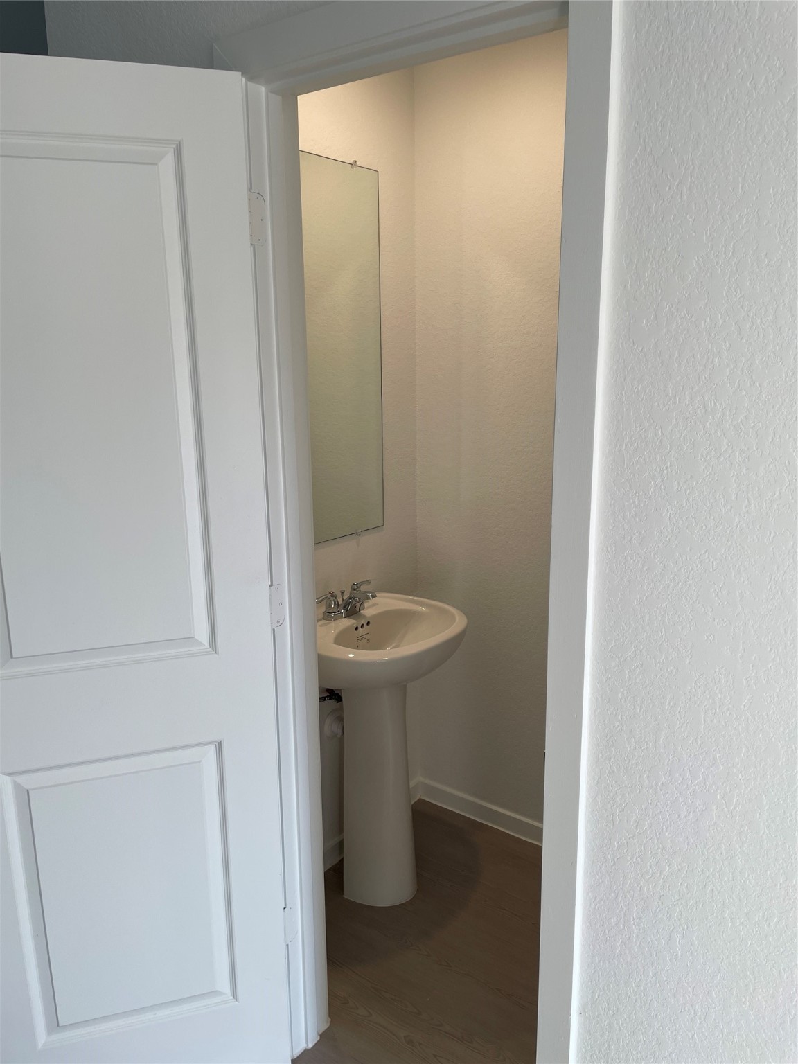 1391 Diamond Carnation Drive Conroe, TX 77301 - Photo 5 of 26 a bathroom with a sink