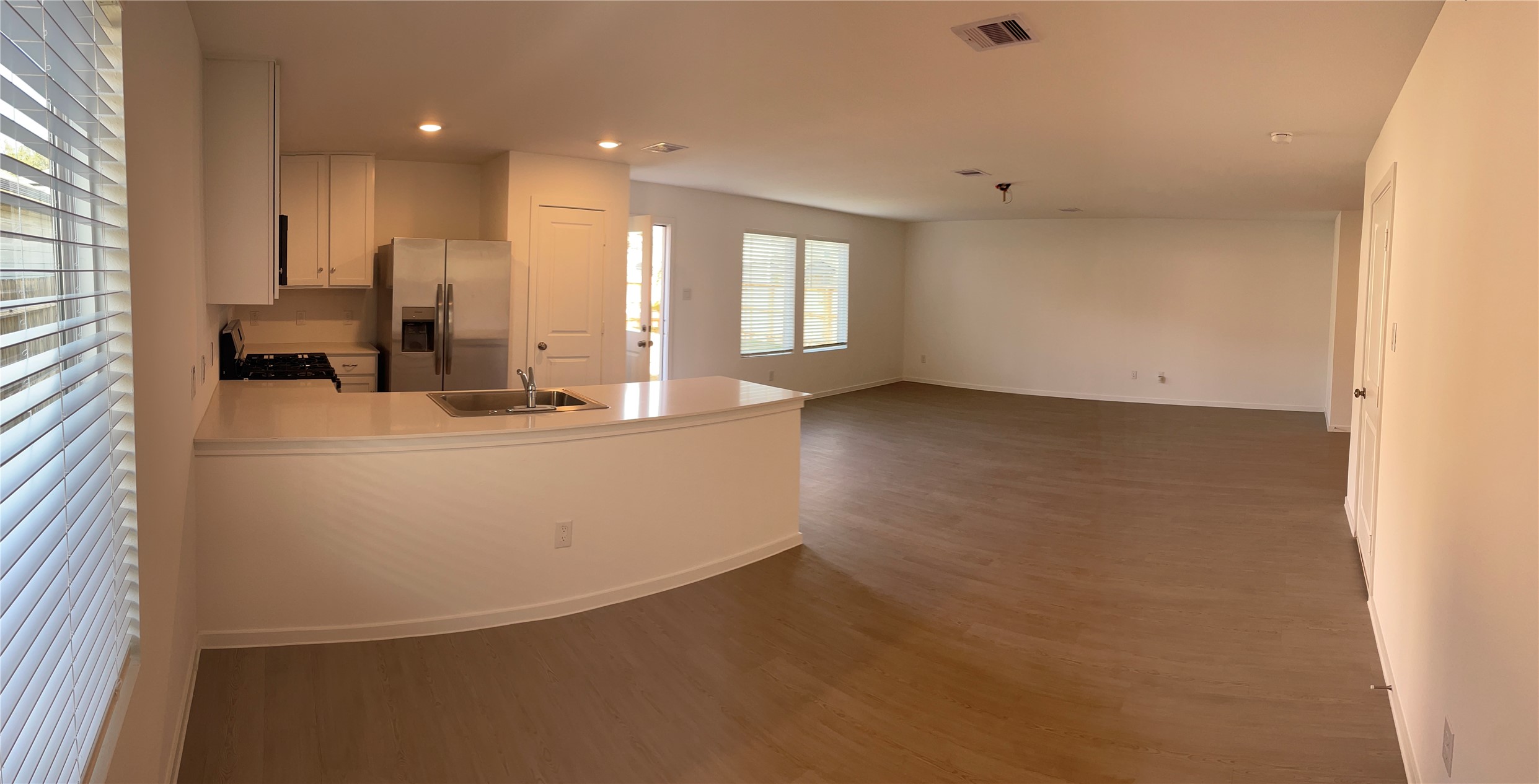 1391 Diamond Carnation Drive Conroe, TX 77301 - Photo 9 of 26 a view of kitchen with furniture and wooden floor