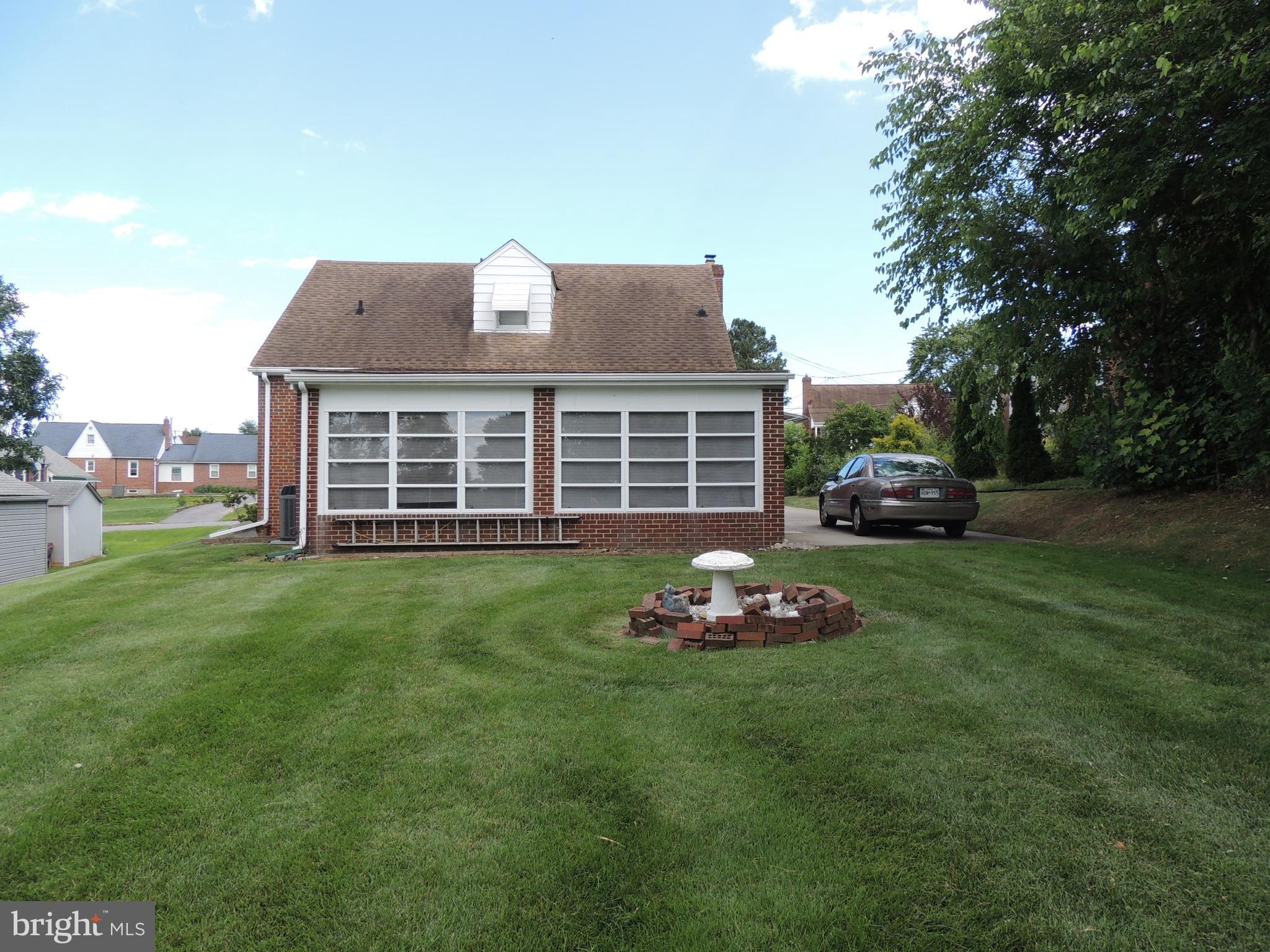 8504 Daytona Road Baltimore, MD 21237 - Photo 2 of 18 Back of Home - Large, well kept, yard