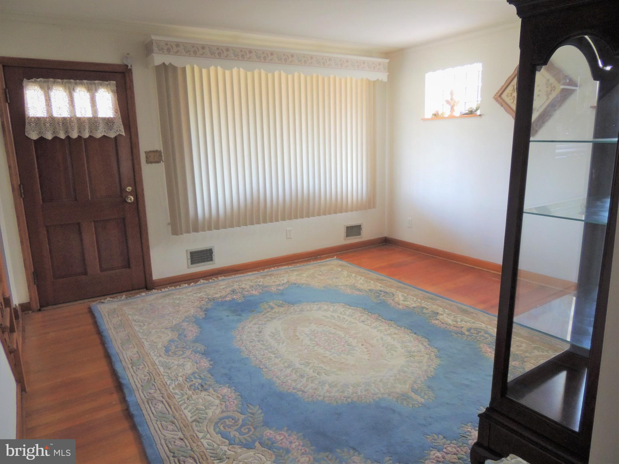 8504 Daytona Road Baltimore, MD 21237 - Photo 4 of 18 Living Room - Bay window - hardwood floors