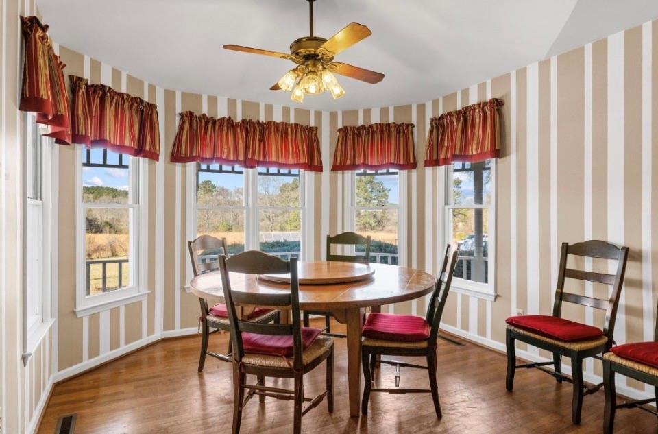 1776 Wax Road Silver Creek, GA 30173 - Photo 11 of 48 a view of a dining room with furniture window and wooden floor