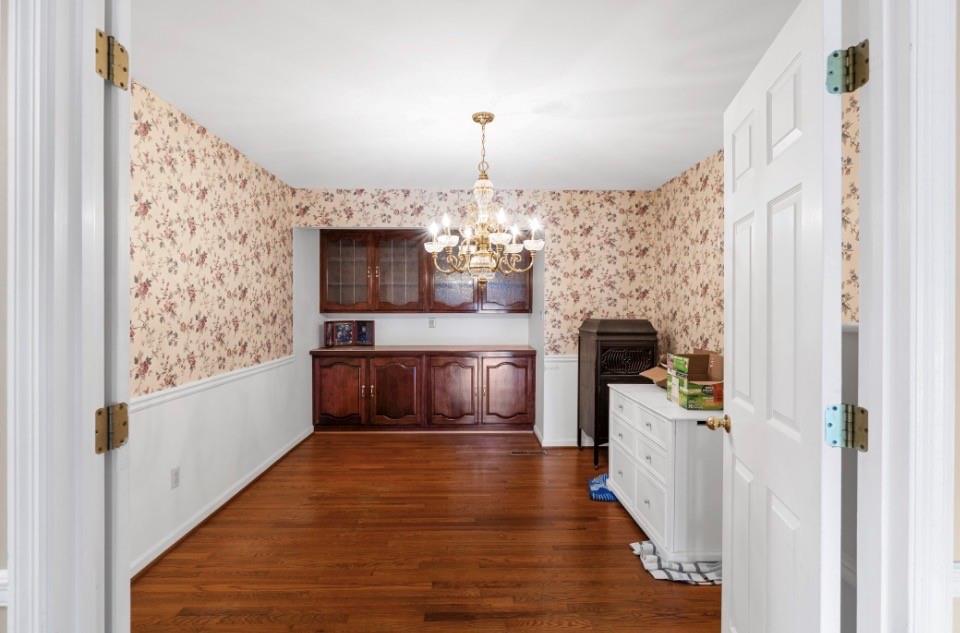 1776 Wax Road Silver Creek, GA 30173 - Photo 12 of 48 a kitchen with kitchen island a sink stainless steel appliances and cabinets
