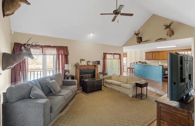 a kitchen with lots of counter top space and dining table