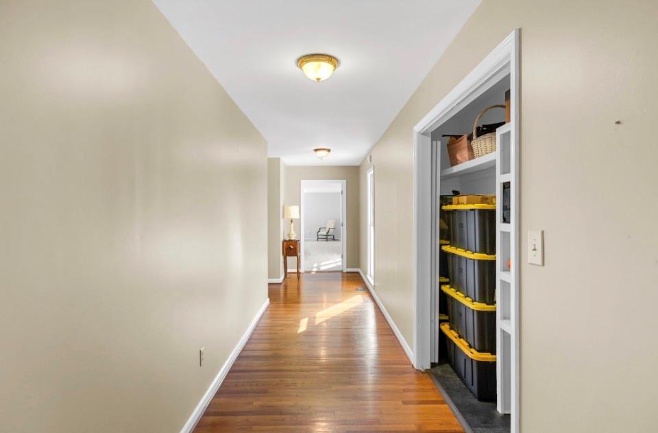 1776 Wax Road Silver Creek, GA 30173 - Photo 38 of 48 a hallway with wooden floor and closet