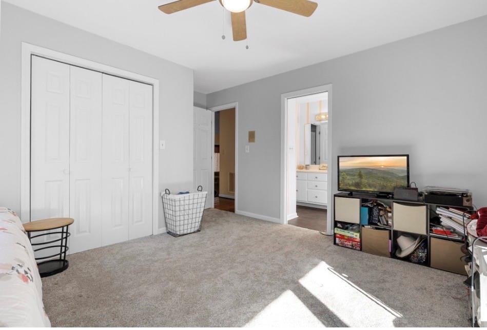 1776 Wax Road Silver Creek, GA 30173 - Photo 41 of 48 a living room with furniture and a flat screen tv