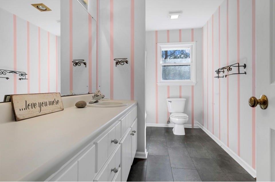 1776 Wax Road Silver Creek, GA 30173 - Photo 42 of 48 a view of a bathroom with a sink and a toilet