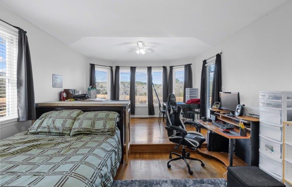 1776 Wax Road Silver Creek, GA 30173 - Photo 44 of 48 a bedroom with furniture and a large window