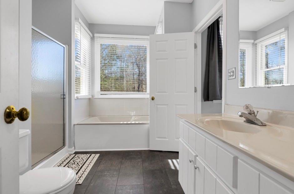 1776 Wax Road Silver Creek, GA 30173 - Photo 46 of 48 a bathroom with a sink toilet and shower
