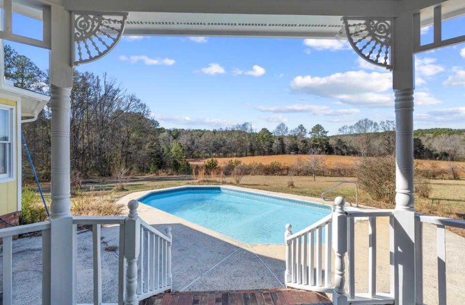 1776 Wax Road Silver Creek, GA 30173 - Photo 8 of 48 a view of swimming pool with lake and mountain view