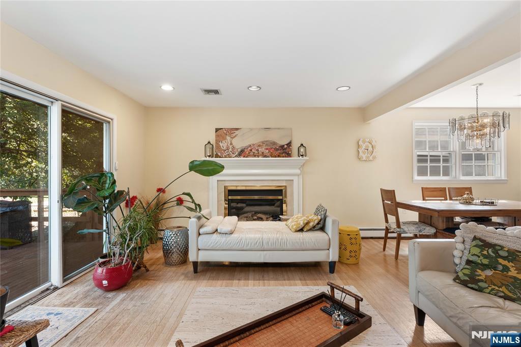 1675 Broad Street Bloomfield, NJ 07003 - Photo 5 of 35 a living room with furniture fireplace and window