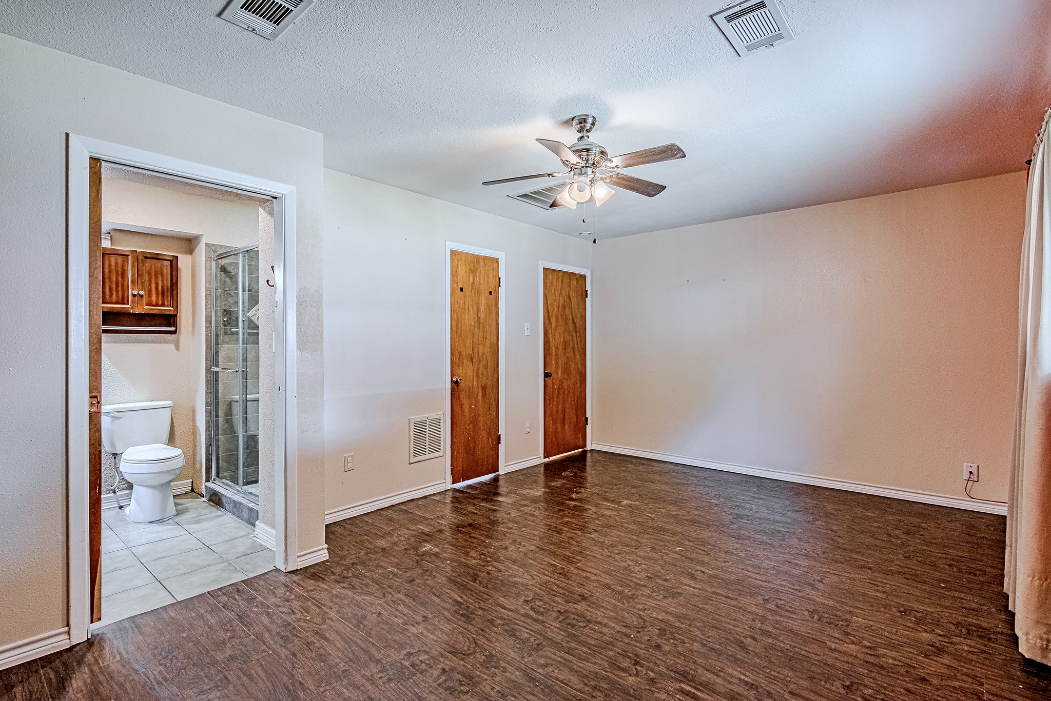 2710 Burke Road Pasadena, TX 77502 - Photo 16 of 28 Alternate view of the primary bedroom with ensuite bath access