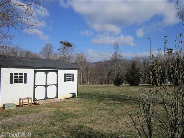 913 Traphill Union Road Traphill, NC 28685 - Photo 5 of 16 View. Mountain view and storage building