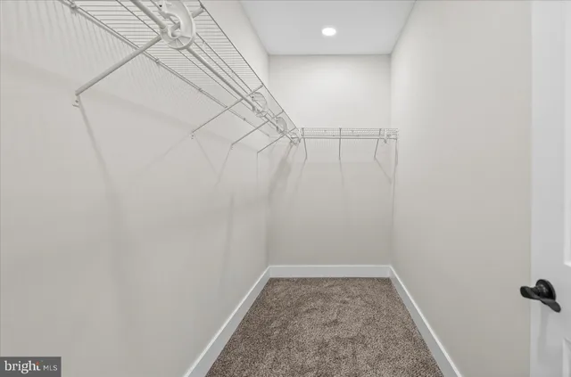 a view of a room with racks on the wall